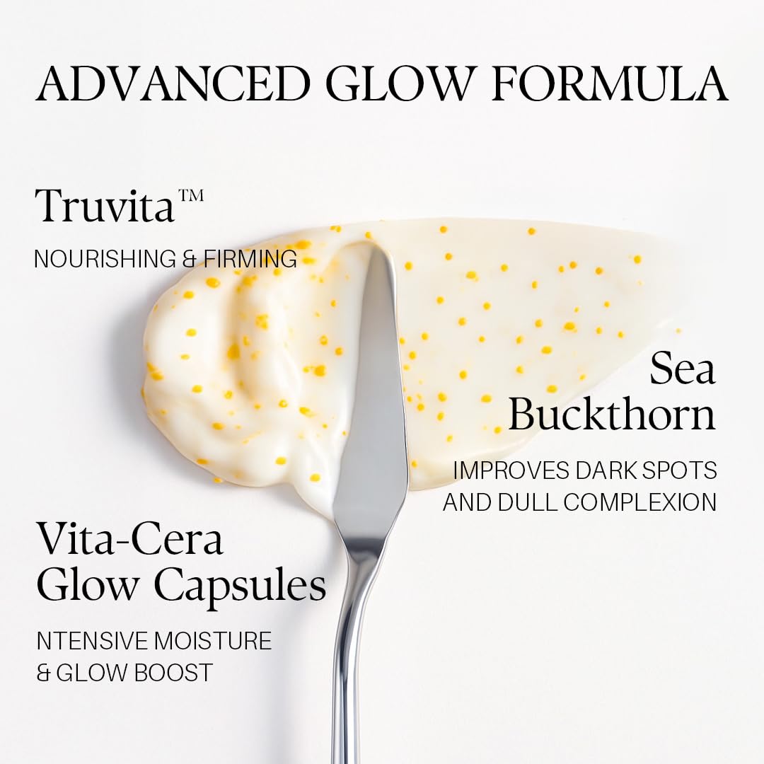 Crème blanche avec microcapsules dorées sur spatule, capsules Vita-Cera d’alba
