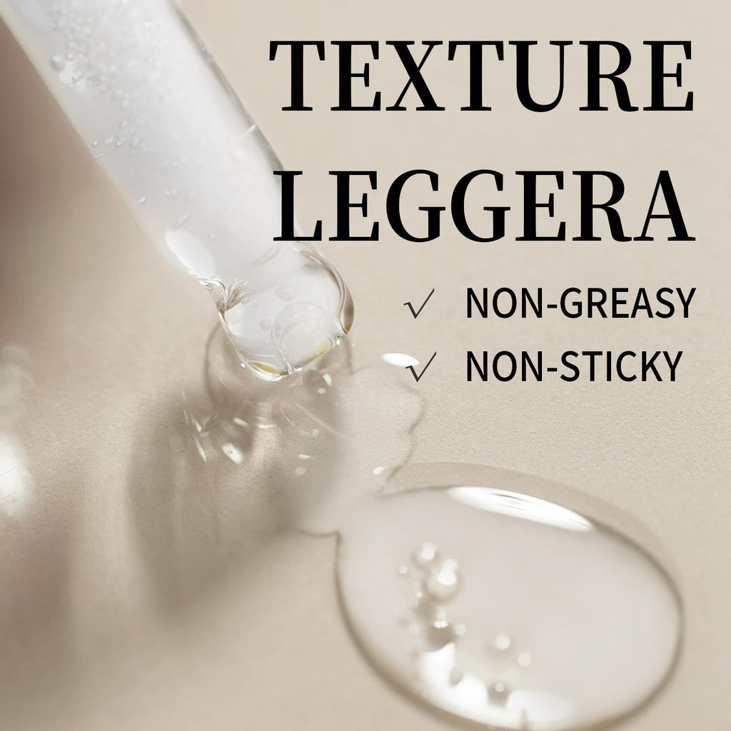 Goutte de sérum fluide sur surface claire, texture légère.