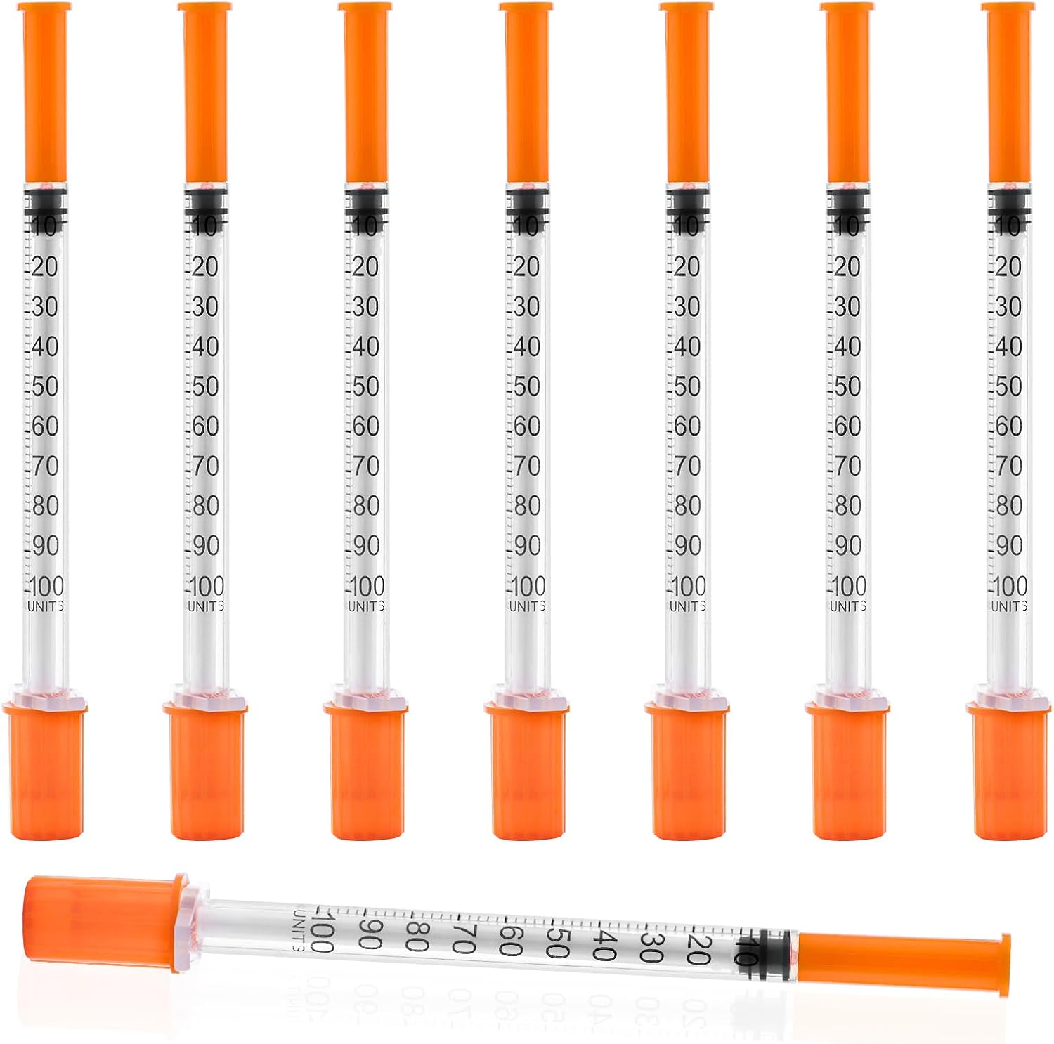 Seringue jetable 1 ml avec aiguille et capuchon orange, échelle graduée visible